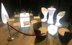 Modern LED lounge furniture rental in Sarasota featuring illuminated sofas, glowing cocktail tables, and a stylish event setup.