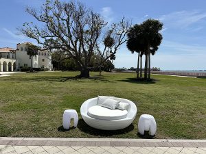 Elegant wedding lounge furniture rental at New College Hall Sarasota featuring LED tables, illuminated bars, and modern wedding seating.